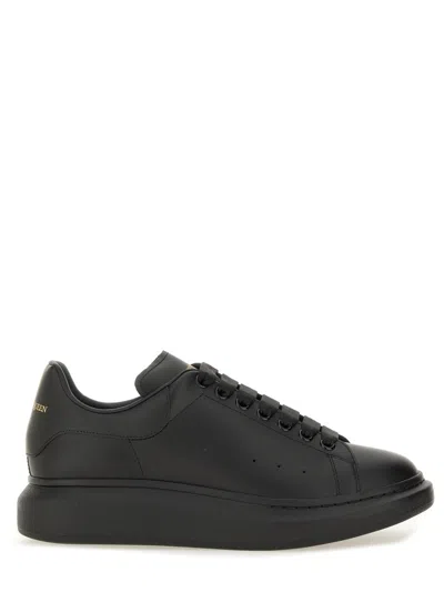 Alexander Mcqueen Black Oversize Sneakers With Logo Lettering On The Heel In Leather Man In Black