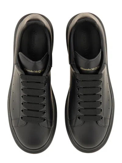 Alexander Mcqueen Black Oversize Sneakers With Logo Lettering On The Heel In Leather Man In Black