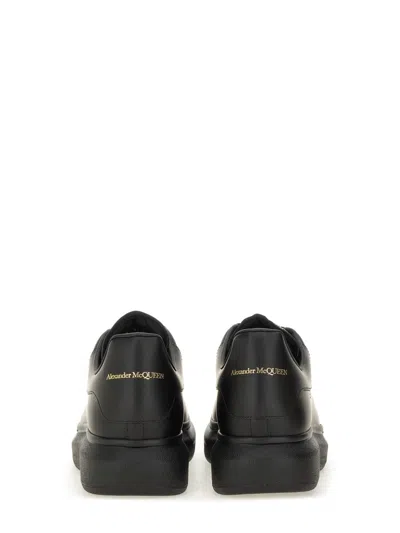 Alexander Mcqueen Black Oversize Sneakers With Logo Lettering On The Heel In Leather Man In Black