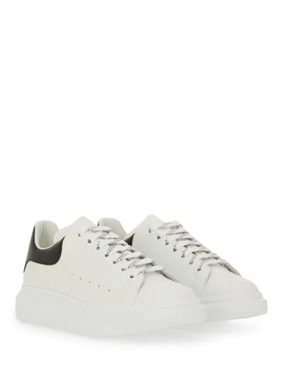 Alexander Mcqueen Men White And Black Low-top Sneakers With Chunky Sole And Contrasting Heel Tab In