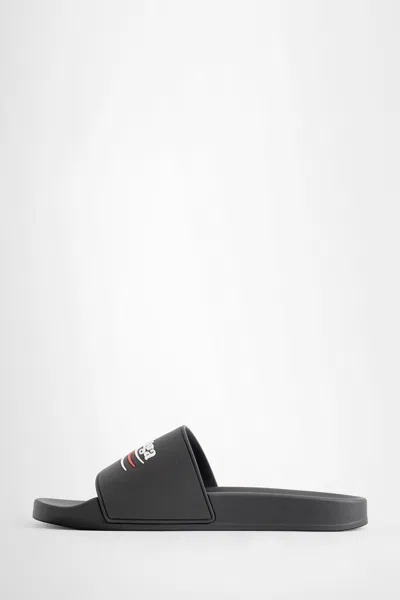 Balenciaga Embossed Logo Slip-on Sandals With Moulded Footbed In Black