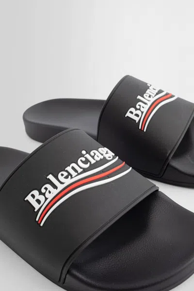 Balenciaga Embossed Logo Slip-on Sandals With Moulded Footbed In Black