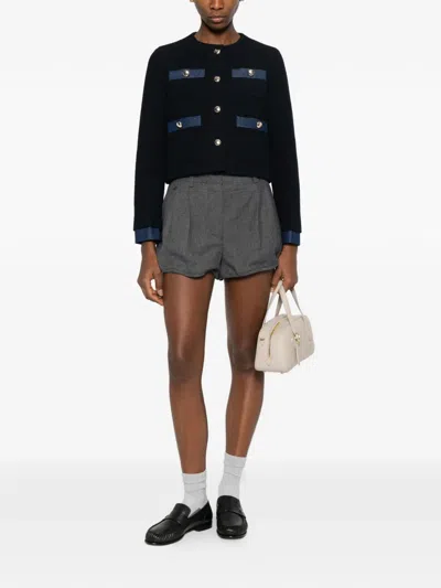 纽扣缀饰粗花呢夹克