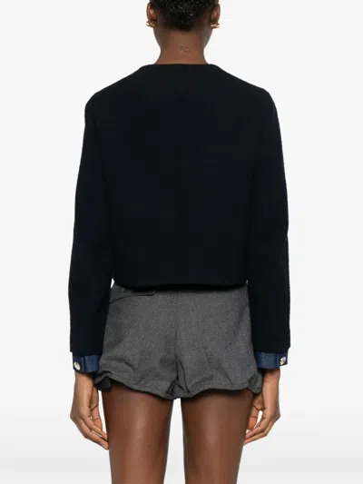 纽扣缀饰粗花呢夹克