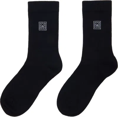 Totême Embroidered Ribbed Cotton-blend Socks In Black
