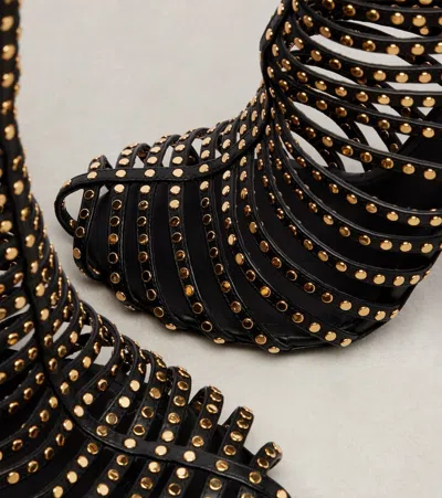 95缀饰皮革及踝靴