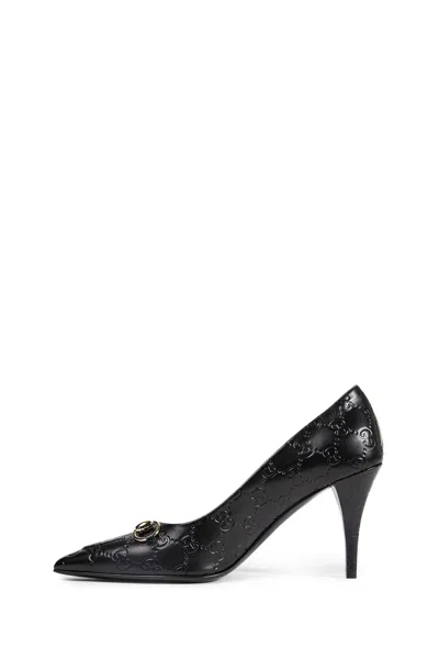 Gucci Calf Leather Bos Taurus Mid Heel Pumps In Animal Print