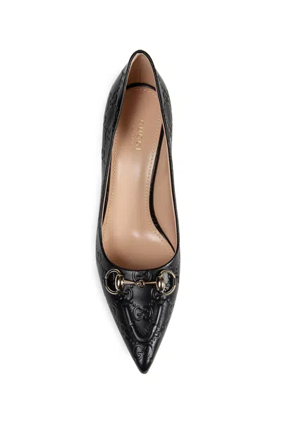 Gucci Calf Leather Bos Taurus Mid Heel Pumps In Animal Print