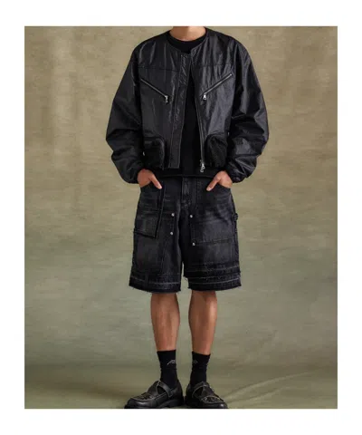 Andersson Bell Patchwork Denim Shorts In Black