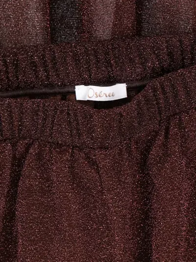 Oseree Lumière Trousers In Semi-transparent Brown Metallic Fabric In Burgundy