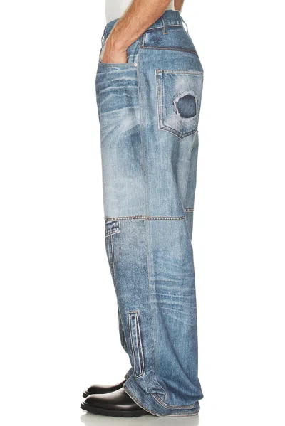 Andersson Bell Custom-like Printed Denim Pants In Blue