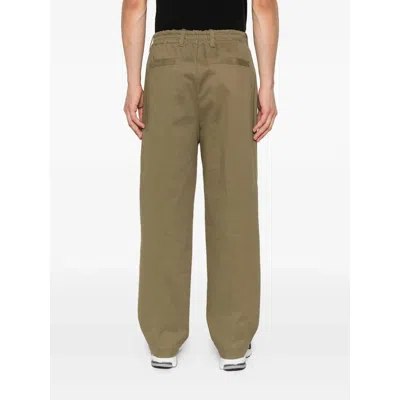 Myths Pleated-front Trousers In Gray