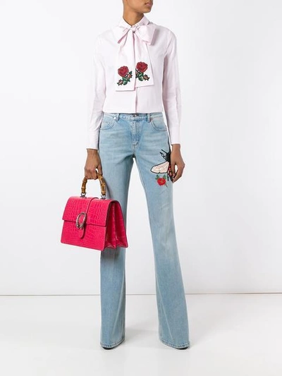 Shop Gucci Embroidered Flared Denim Jeans In Blue