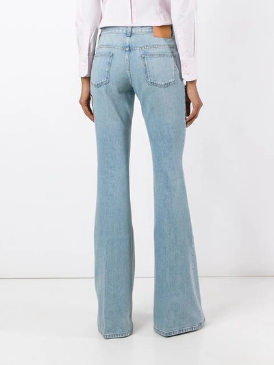 Shop Gucci Embroidered Flared Denim Jeans In Blue