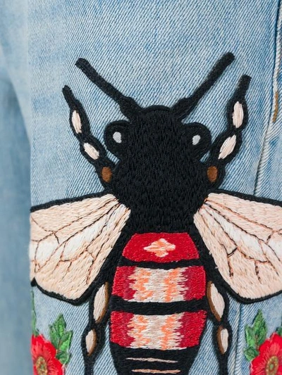 蜜蜂刺绣喇叭牛仔裤