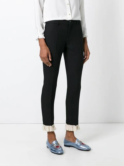 Shop Gucci Frill Detail Slim Fit Trousers In Black