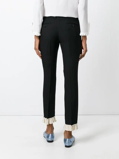 Shop Gucci Frill Detail Slim Fit Trousers In Black
