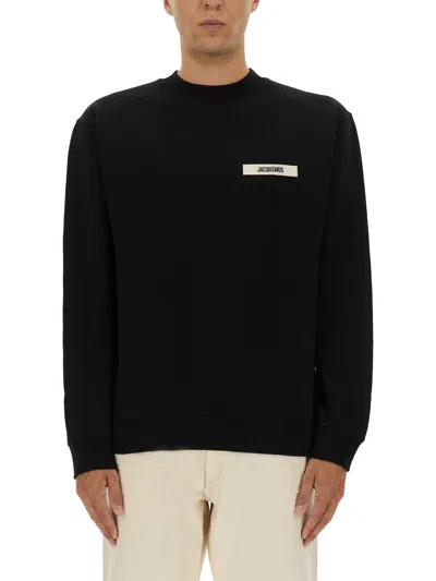 Jacquemus Relaxed Fit Long-sleeve Shirt With Minimalist Patch Detail In Black