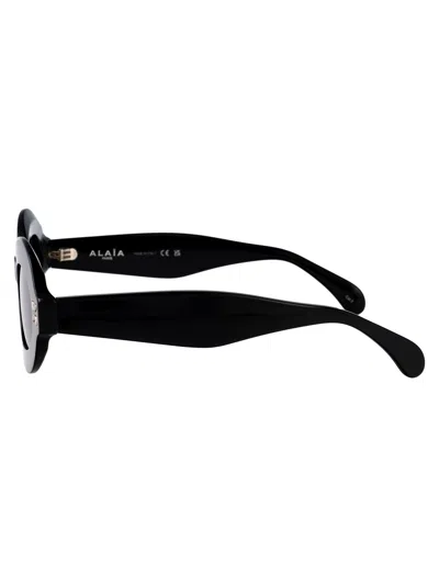 Alaïa Oval-frame Acetate Sunglasses In Black