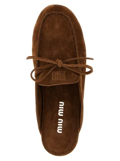 Miu Miu Suede Sabots Rounded Toe Bow Detail In Brown
