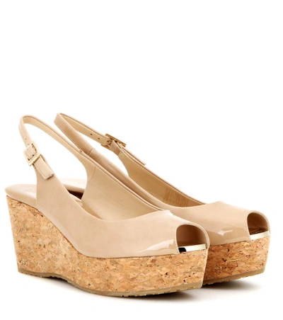 Shop Jimmy Choo Praise Patent Leather Wedges In Beige