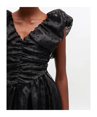 Ganni Ruched Flocked Polka-dot Recycled Organza Midi Dress In Black