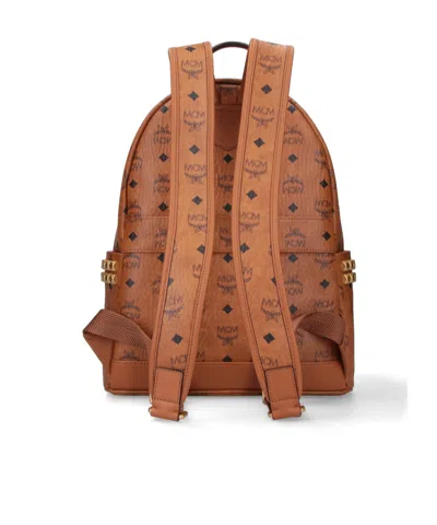 Mcm Studded Front Zip Backpack In Brown