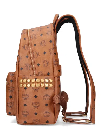 Mcm Studded Front Zip Backpack In Brown