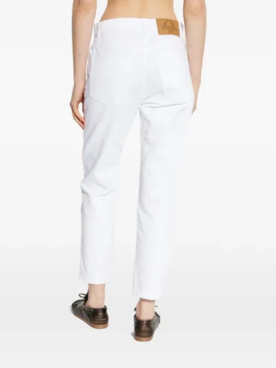 Moschino Distressed Denim Jeans In White