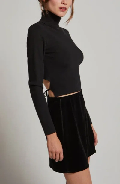 Crescent Turtleneck Tie Back Knit Top In Black