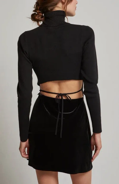 Crescent Turtleneck Tie Back Knit Top In Black
