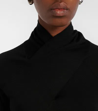 Totême Wool And Silk-blend Turtleneck Sweater In Black