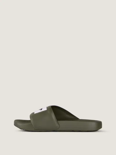 Givenchy Label Slide Flat Mules In Rubber In Green
