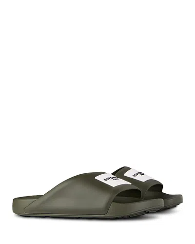 Givenchy Label Slide Flat Mules In Rubber In Green