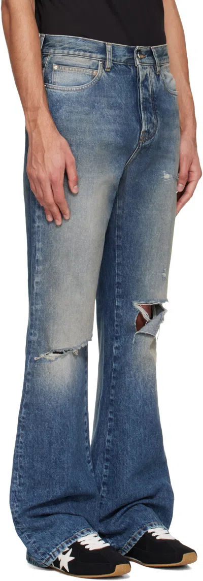 Amiri Blue Slashed Bootcut Jeans In Blue