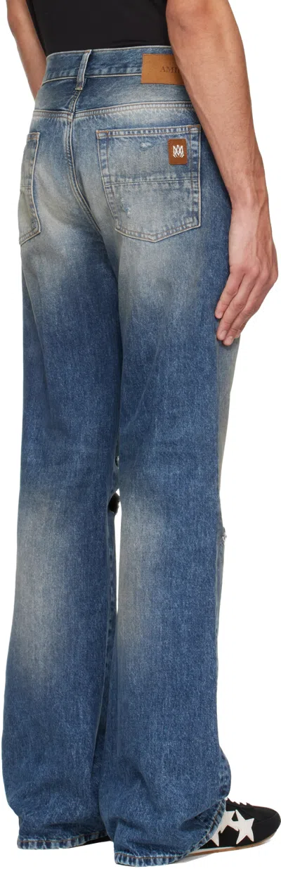 Amiri Blue Slashed Bootcut Jeans In Blue