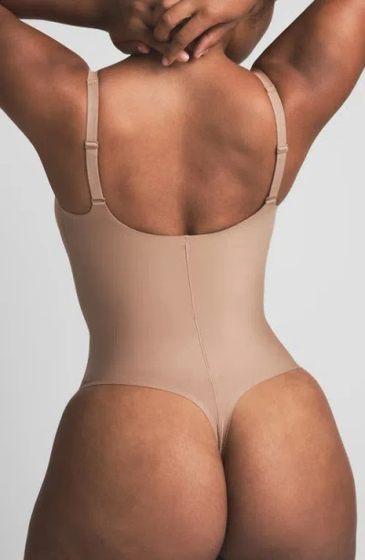 Skims Body Core Sculpt Plunge Bodysuit In Brown