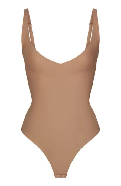 Skims Body Core Sculpt Plunge Bodysuit In Brown
