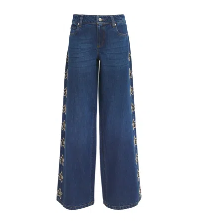 Alice And Olivia Amazing Low Rise Wide Leg Snap Trim Jeans In Cambria Vintage In Blue