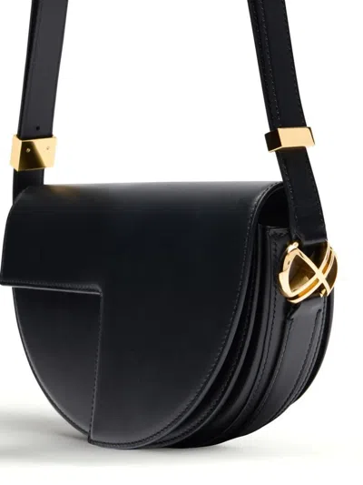 Patou Leather Shoulder Bag In Black