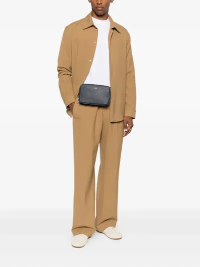 Sandro Leather Messenger Bag In Blue