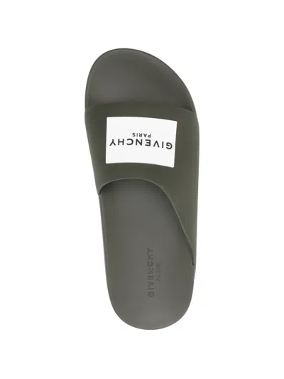 Givenchy Label Slide Flat Mules In Rubber In Green