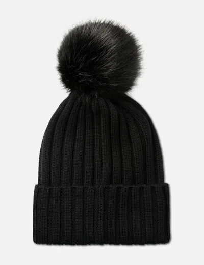 Moncler Ribbed Knit Wool Beanie With Faux Fur Pom-pom In Black