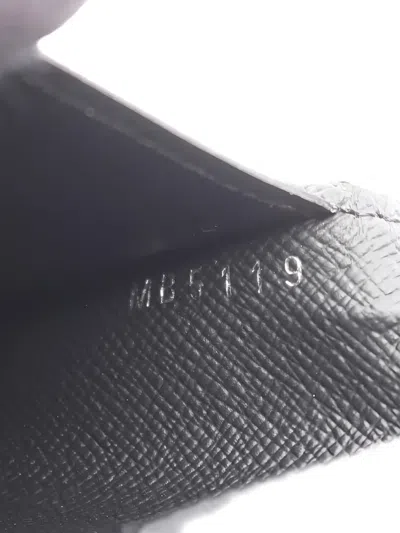 Pre-owned Louis Vuitton 2019 Brazza Monogram Eclipse Bi-fold Wallet In Black