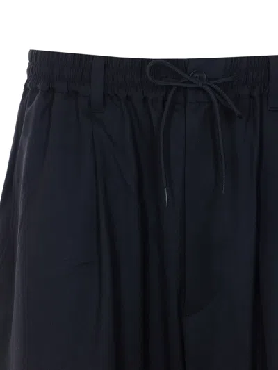 Y-3 Elasticated Logo Patch Trousers In Blue