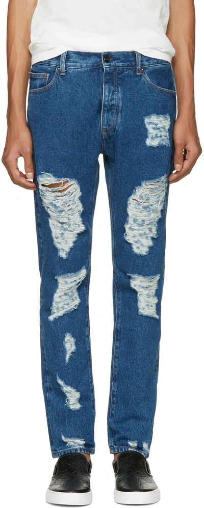 Shop Palm Angels Blue Ripped Jeans