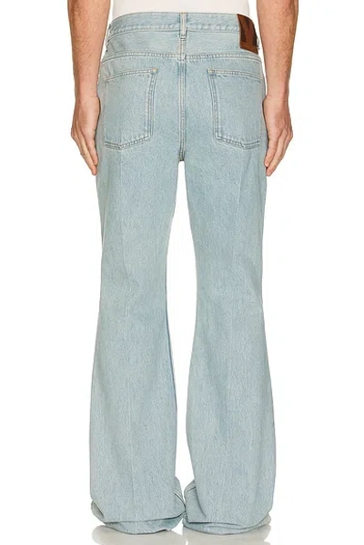 Valentino Logo Patch Flared Jeans In Blue