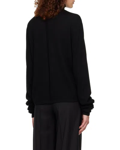 The Row Carlus Turtleneck Wool Sweater In Black