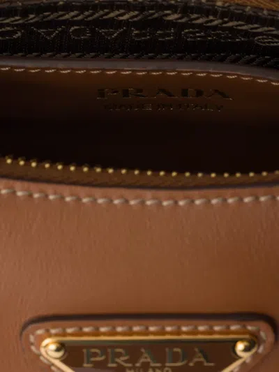Prada Mini Arqué Shoulder Bag In Brown