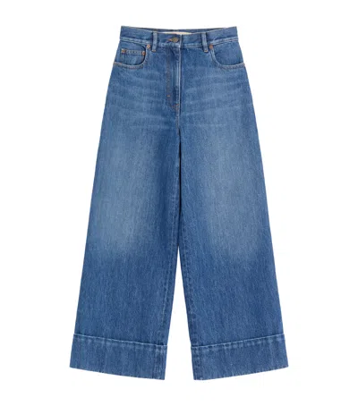 Valentino Cuffed Ankle Jeans With Front Button And Zip Closure In Blue